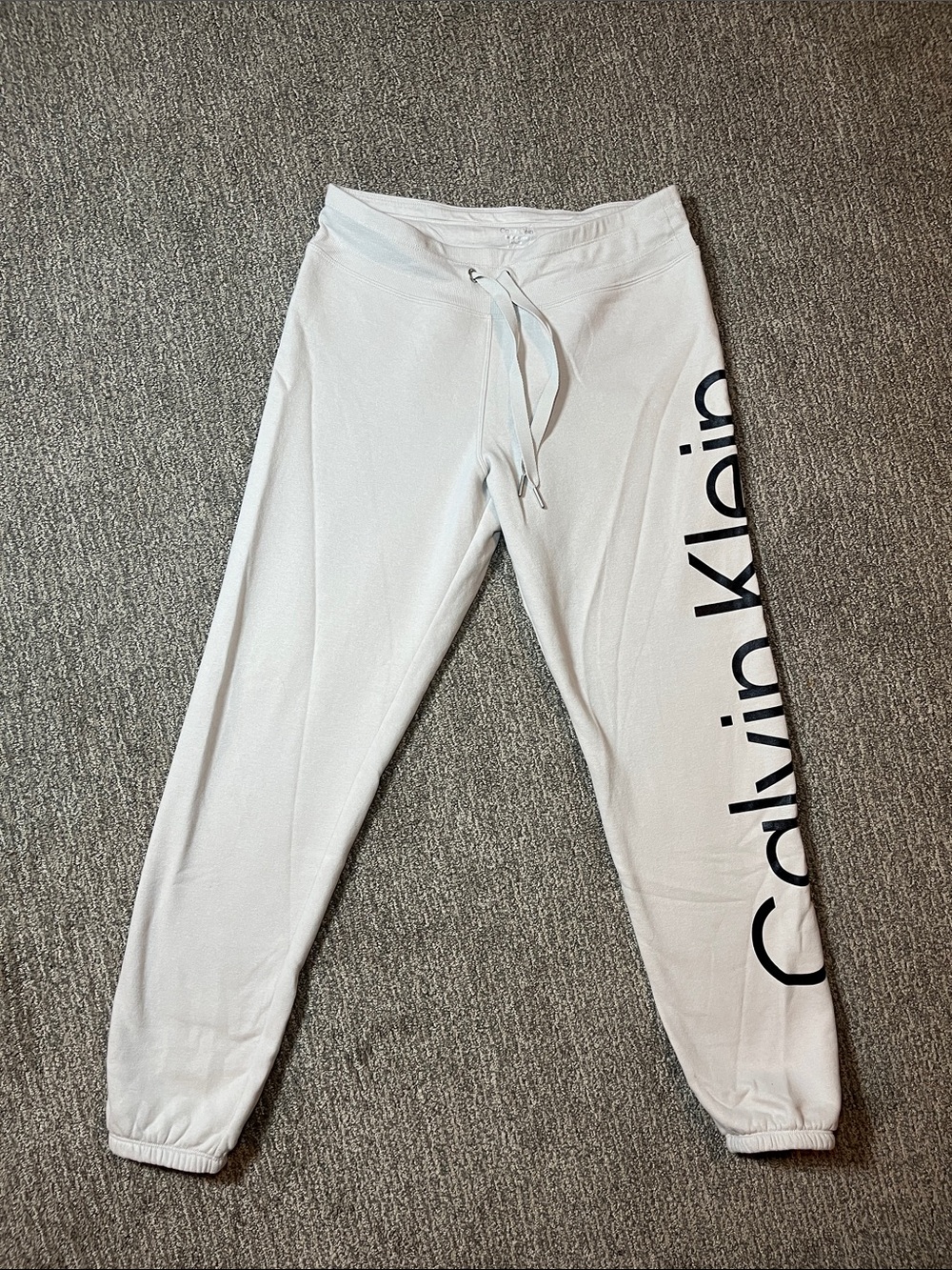 Calvin Klein White Jogger Sweatpants with Black Side Logo Text